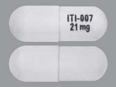 Esto es un Cápsula blanco oblongo imprimido con ITI-007  21 mg en la parte delantera, nada en la parte posterior, y es fabricado por INTRA-CELLULAR.