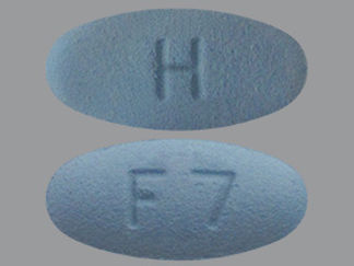 Esto es un Tableta Er 24 Hr imprimido con H en la parte delantera, F7 en la parte posterior, y es fabricado por None.