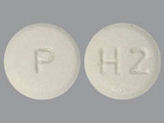 This is a white round Tablet imprinted with H2 on the front, P on the back, and is manufactured by CAMBER PHARMACE.