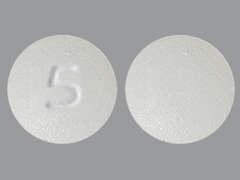 This is a Tablet imprinted with 5 on the front, nothing on the back.