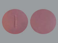 This is a Tablet imprinted with 1 on the front, nothing on the back.