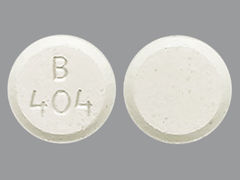 This is a Tablet imprinted with B  404 on the front, nothing on the back.