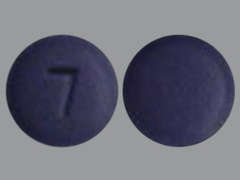 This is a Tablet imprinted with 7 on the front, nothing on the back.