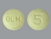 Olmesartan Medoxomil: This is a Tablet imprinted with OLM on the front, 5 on the back.