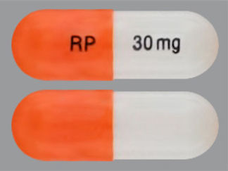 This is a Capsule imprinted with RP on the front, 30 mg on the back.