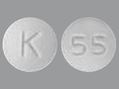 Esto es un Tableta imprimido con K en la parte delantera, 55 en la parte posterior.