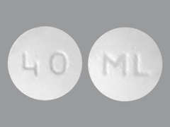 This is a white round Tablet imprinted with ML on the front, 40 on the back, and is manufactured by NOVADOZ PHARMAC.