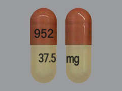 This is a ivory oblong Capsule Er Triphasic 24hr imprinted with 952 on the front, 37.5 mg on the back, and is manufactured by SUN PHARMACEUTI.
