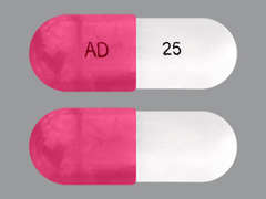 This is a pink oblong Capsule imprinted with AD on the front, 25 on the back, and is manufactured by AARNA USA INC.