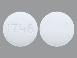This is a Tablet imprinted with 1746 on the front, nothing on the back.