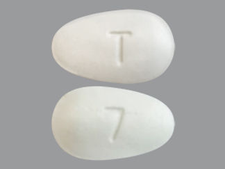 This is a Tablet imprinted with T on the front, 7 on the back.