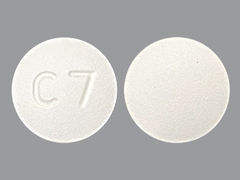 This is a Tablet imprinted with C7 on the front, nothing on the back.