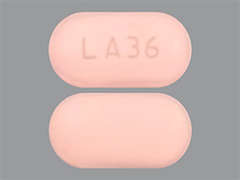 Esto es un Tableta rosado oblongo imprimido con LA36 en la parte delantera, nada en la parte posterior, y es fabricado por LAURUS LABS LIM.