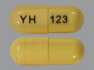 Esto es un Cápsula Para Rociar LP 24 Hr imprimido con YH en la parte delantera, 123 en la parte posterior, y es fabricado por None.