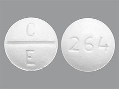 Esto es un Tableta blanco redondo imprimido con C  E en la parte delantera, 264 en la parte posterior, y es fabricado por CHARTWELL RX LL.