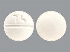This is a white round Tablet imprinted with 74 on the front, nothing on the back, and is manufactured by RISING PHARM.