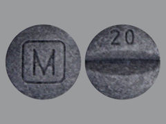 Esto es un Tableta imprimido con M en la parte delantera, 20 en la parte posterior, y es fabricado por None.