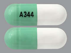 This is a bright light green oblong Capsule imprinted with A 344 on the front, nothing on the back, and is manufactured by ALEMBIC PHARMAC.