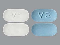 Esto es un Tableta Empaque De Dosis multicolor (2) oblongo imprimido con V1 or V2 en la parte delantera, nada en la parte posterior, y es fabricado por AJANTA PHARMA L.