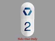 Nitisinone: This is a white oblong Capsule imprinted with logo on the front, 2 on the back, and is manufactured by ANALOG PHARMA,.
