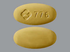 This is a yellow oval Tablet imprinted with logo and 776 on the front, nothing on the back, and is manufactured by MERCK SHARP & D.