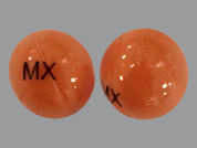Dronabinol: This is a orange round Capsule imprinted with MX on the front, nothing on the back, and is manufactured by ASCEND LABORATO.