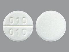 This is a white round Tablet imprinted with 010  010 on the front, nothing on the back, and is manufactured by VITRUVIAS THERA.