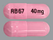 Esomeprazole Magnesium: This is a pink oblong Capsule Dr imprinted with RB67 on the front, 40 mg on the back, and is manufactured by OHM-SUN PHARMAC.