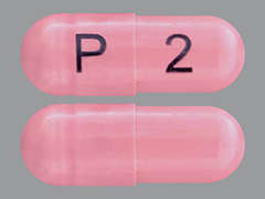 This is a pink oblong Capsule imprinted with P on the front, 2 on the back, and is manufactured by UNICHEM-IPCA.