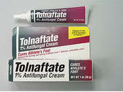 Tolnaftate: This is a white Cream imprinted with nothing on the front, nothing on the back, and is manufactured by TARO/SUN PHARMA.