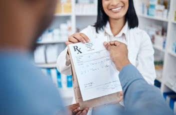 Pharmacists hands, drugs store label and woman in hospital retail shop