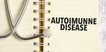 Autoimmune disease words on yellow notebook