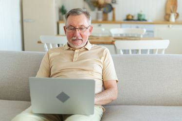 Older man on laptop computer