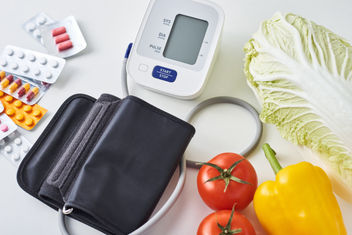 Blood pressure monitor, medication and vegetables