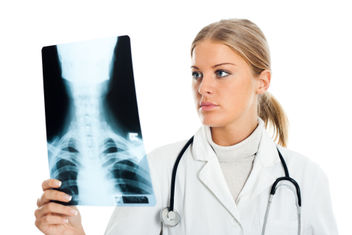 Female doctor reviewing an x-ray