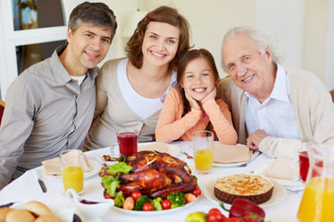 Family gathered around the dinner table