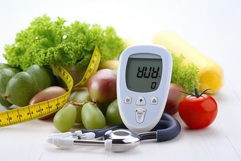 Glucose meter with fresh fruits and vegetables