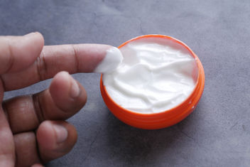 Man applying skin cream