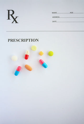 Different pills on a prescription form