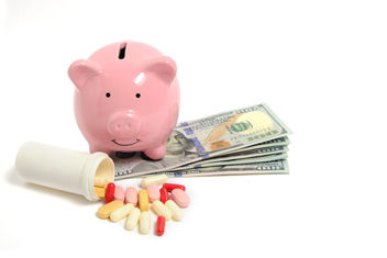 Medications, piggy bank, and money