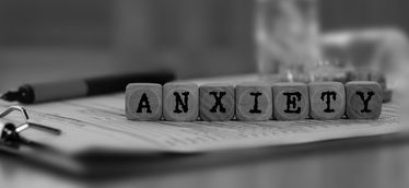 The word Anxiety composed of wooden dices