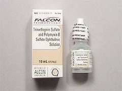 This is a colorless Drops imprinted with nothing on the front, nothing on the back, and is manufactured by SANDOZ.