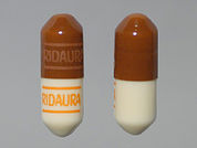 Ridaura: This is a Capsule imprinted with RIDAURA on the front, RIDAURA on the back.