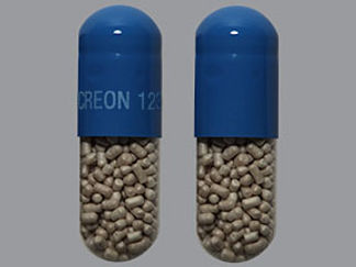 This is a Capsule Dr imprinted with CREON 1236 on the front, nothing on the back.