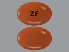 This is a orange-brown oval Capsule imprinted with ZF on the front, nothing on the back, and is manufactured by ABBVIE US LLC.