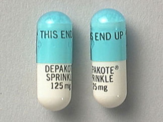 Esto es un Cápsula Dr Para Rociar imprimido con THIS END UP en la parte delantera, DEPAKOTE  SPRINKLE  125mg en la parte posterior, y es fabricado por None.