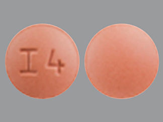 This is a Tablet imprinted with I4 on the front, nothing on the back.