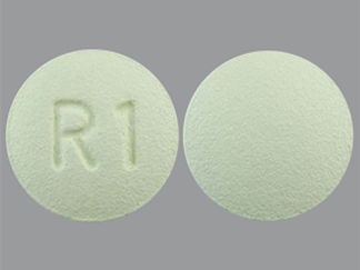 This is a Tablet imprinted with R 1 on the front, nothing on the back.