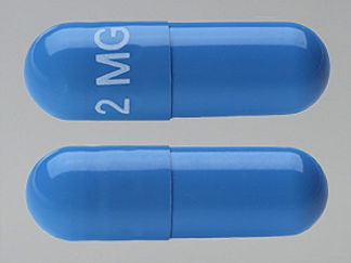 This is a Capsule imprinted with 2 MG on the front, nothing on the back.