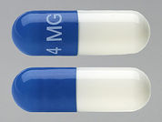 Zanaflex: This is a Capsule imprinted with 4 MG on the front, nothing on the back.